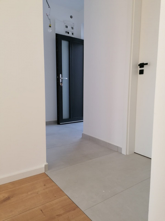 Duplex 4 camere Mosnita Noua pozitionat la asfalt cu toate utilitatile 25, foxfort.ro