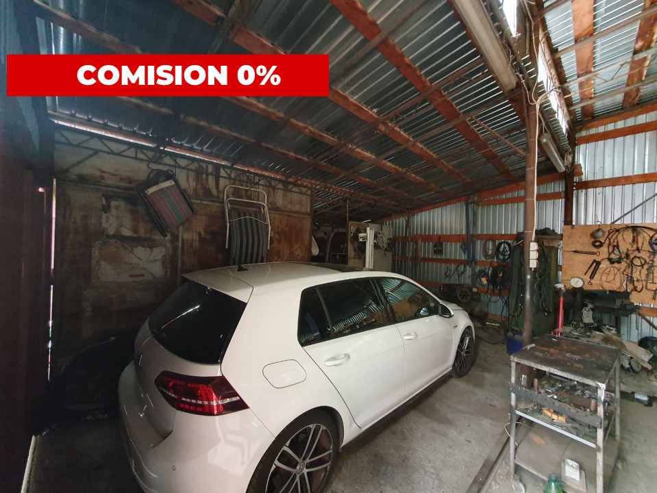 Casa cu 5 camere si service auto, teren total de 400 mp, zona Steaua 30, foxfort.ro