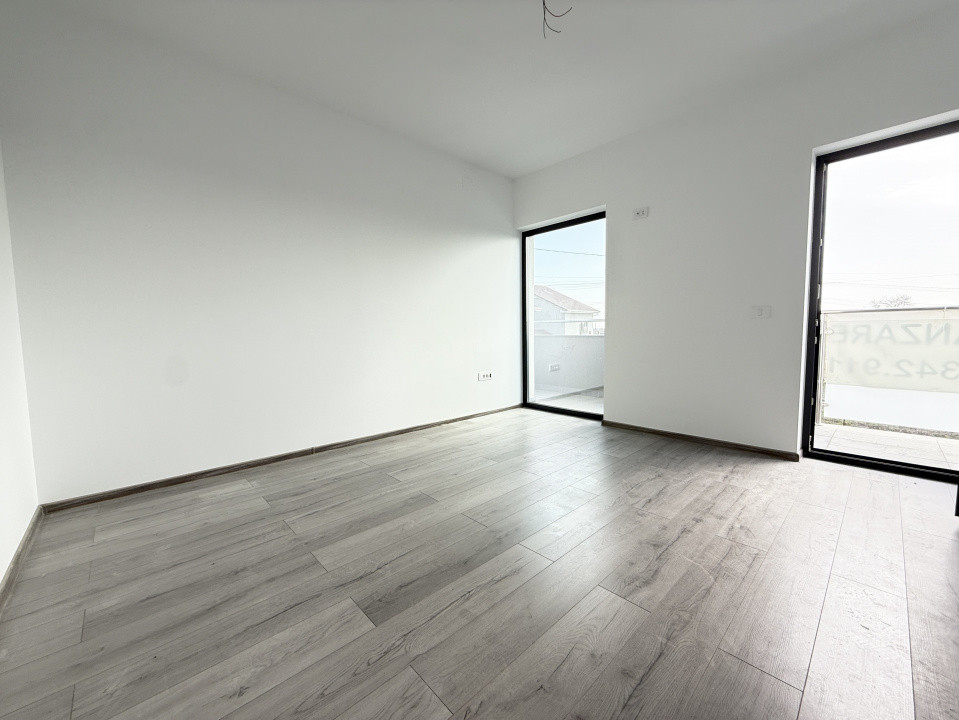 Casa individuala cu 4 camere, situata la drum asfaltat in Sacalaz 40, foxfort.ro